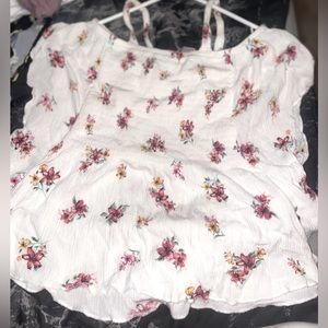 white flowered off the shoulder shirt